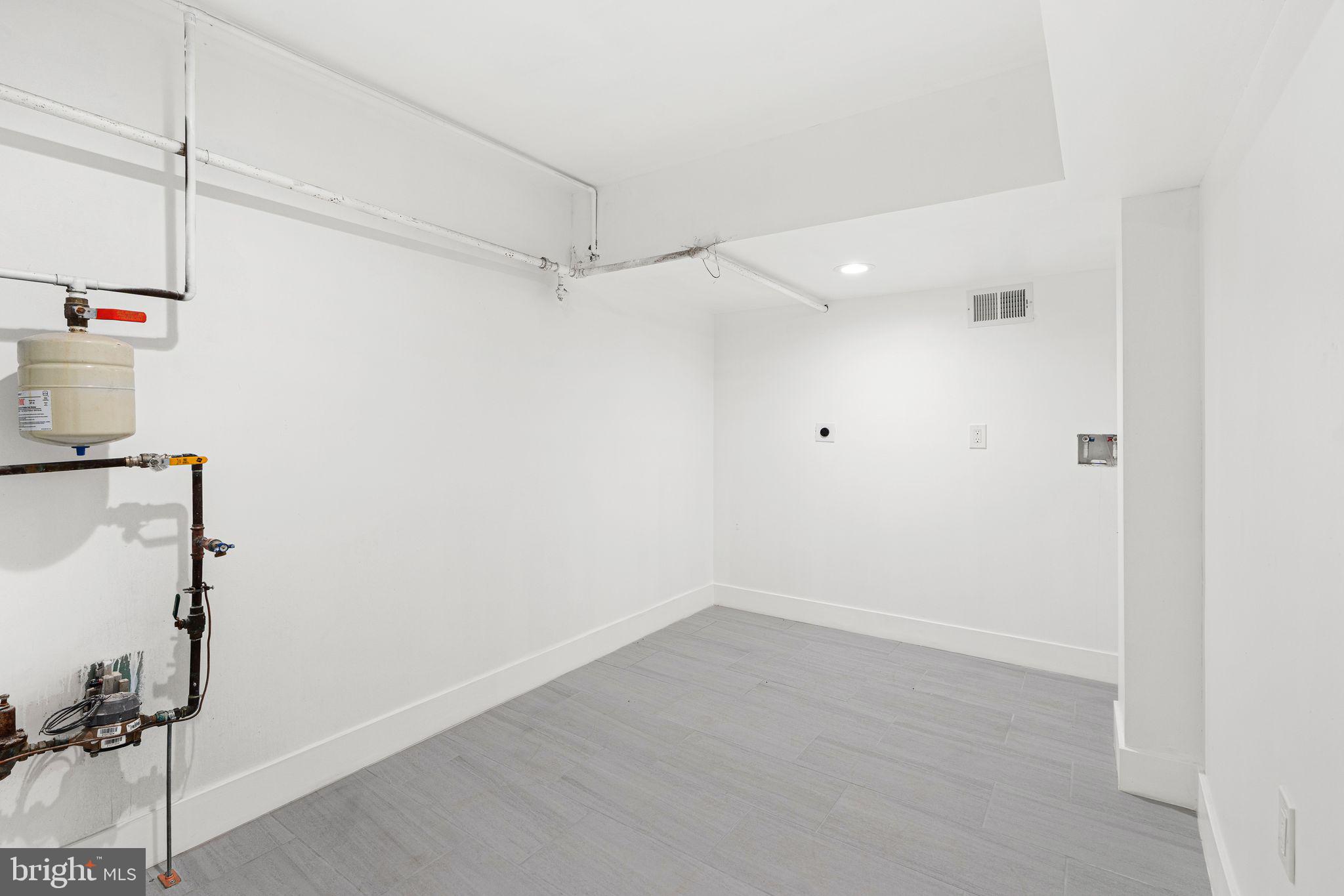 726 Darby Paoli Road Newtown Square, PA 19073 - Photo 55 of 55 a view of a room with racks on the wall