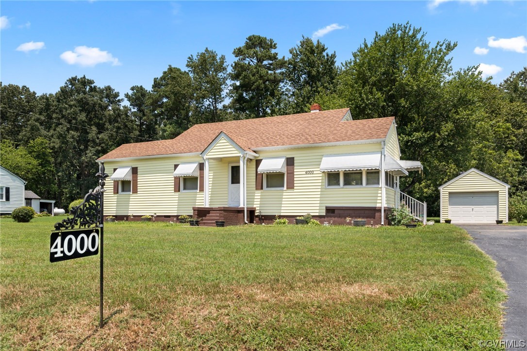 4000 Wayside Road Charles City, VA 23030 - Photo 1 of 30 a front view of a house with a yard