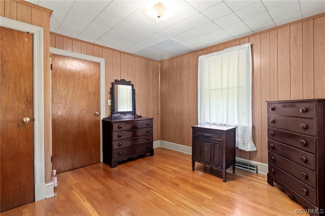 4000 Wayside Road Charles City, VA 23030 - Photo 12 of 30 a room with a dresser and a window