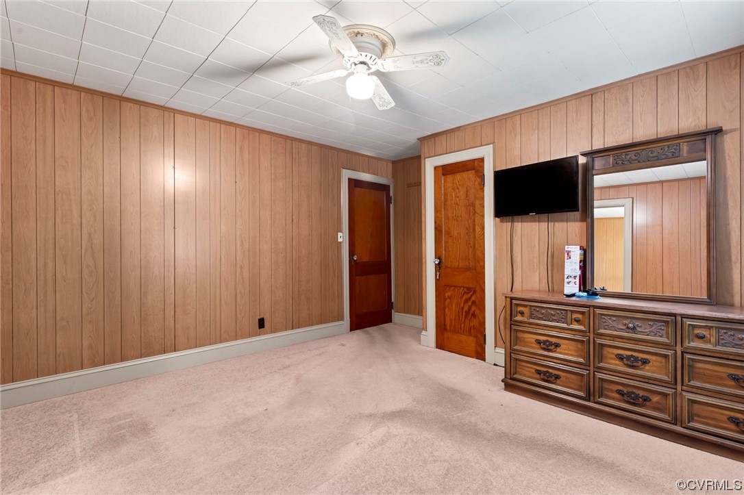 4000 Wayside Road Charles City, VA 23030 - Photo 15 of 30 a view of an empty room with a flat tv screen and dresser