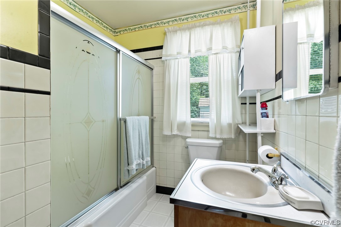4000 Wayside Road Charles City, VA 23030 - Photo 18 of 30 a bathroom with a sink and a large mirror