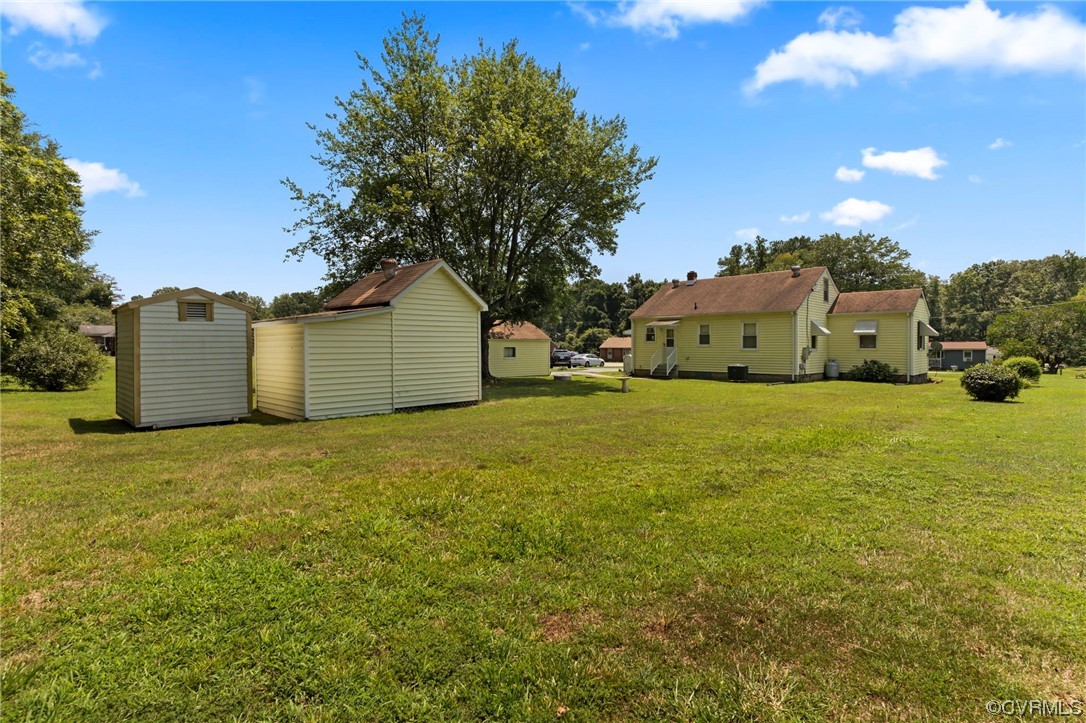 4000 Wayside Road Charles City, VA 23030 - Photo 23 of 30 a view of a yard with an house and wooden fence