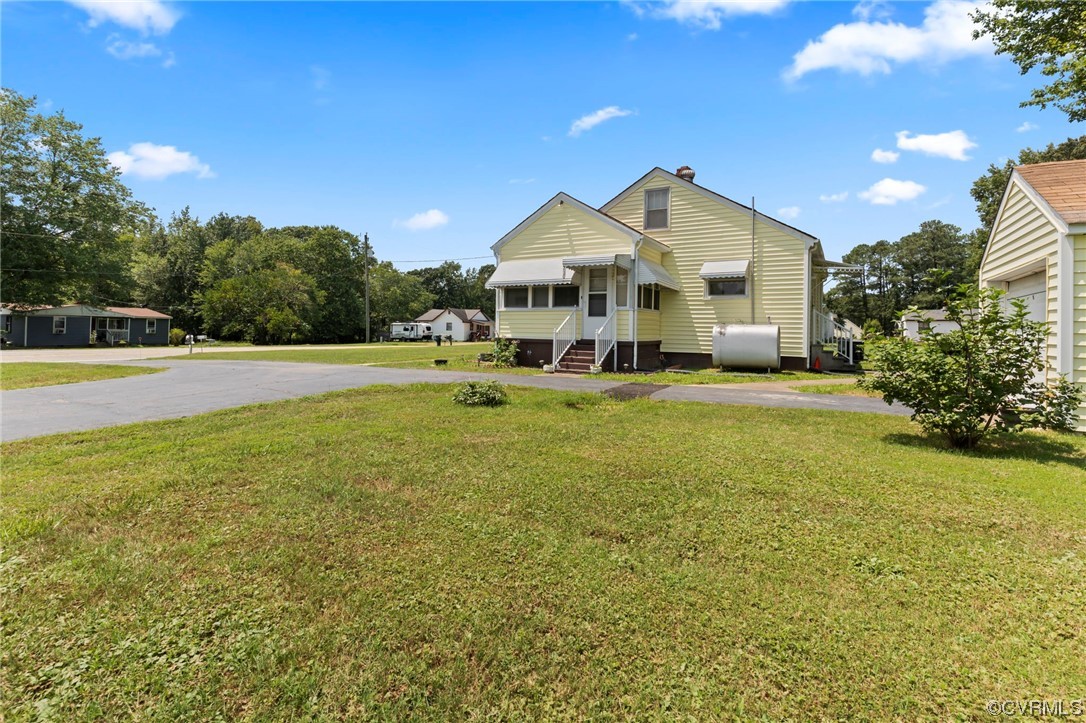4000 Wayside Road Charles City, VA 23030 - Photo 25 of 30 a front view of a house with a big yard