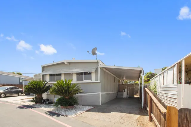 a view of a house with a patio