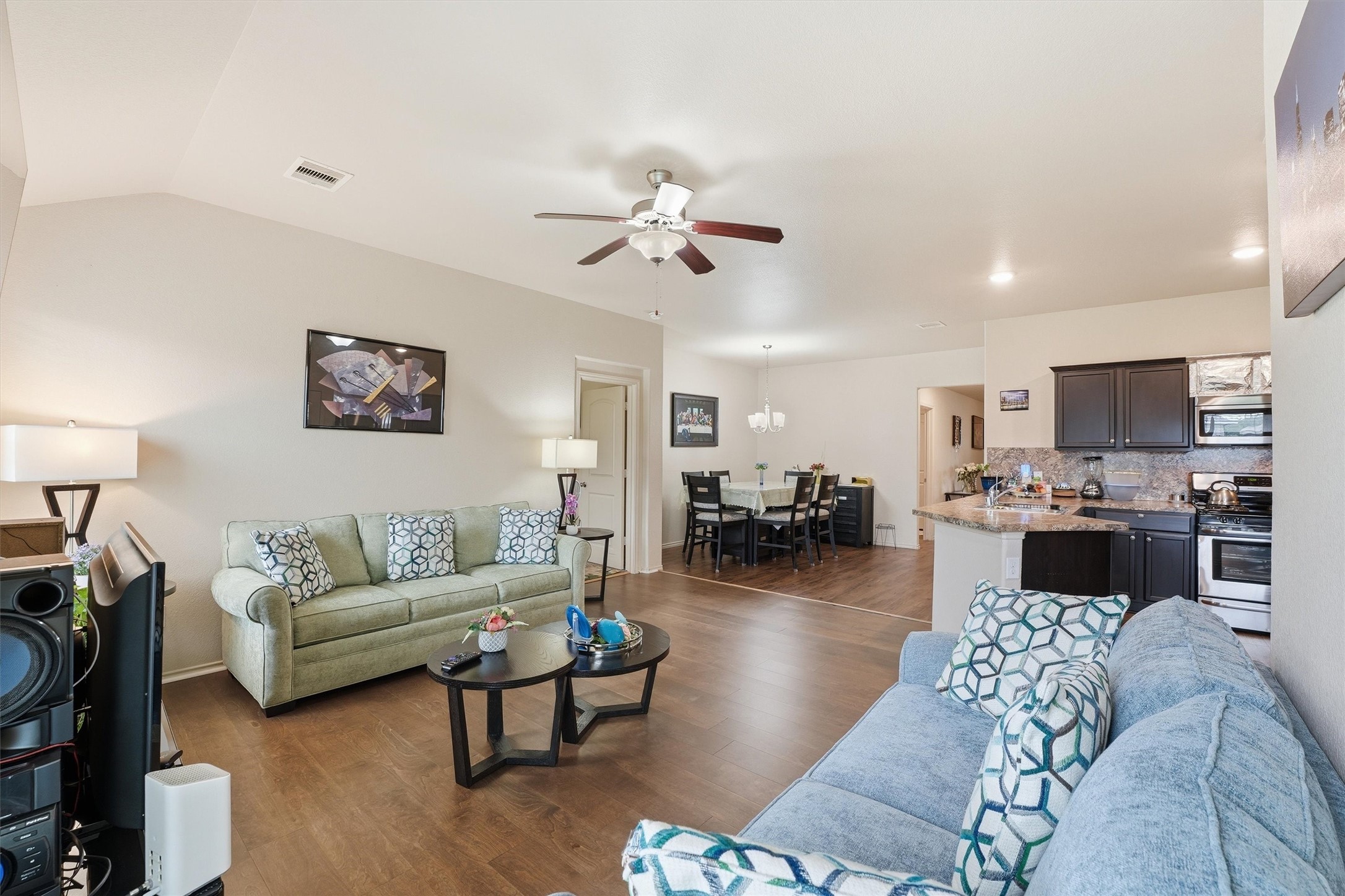 15455 Rancho Joya Way Houston, TX 77049 - Photo 11 of 20 a living room with furniture kitchen view and a window