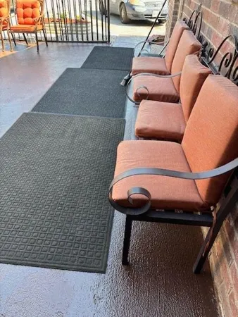 a balcony with wooden floor