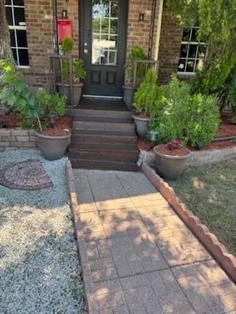 a view of a backyard with sitting area