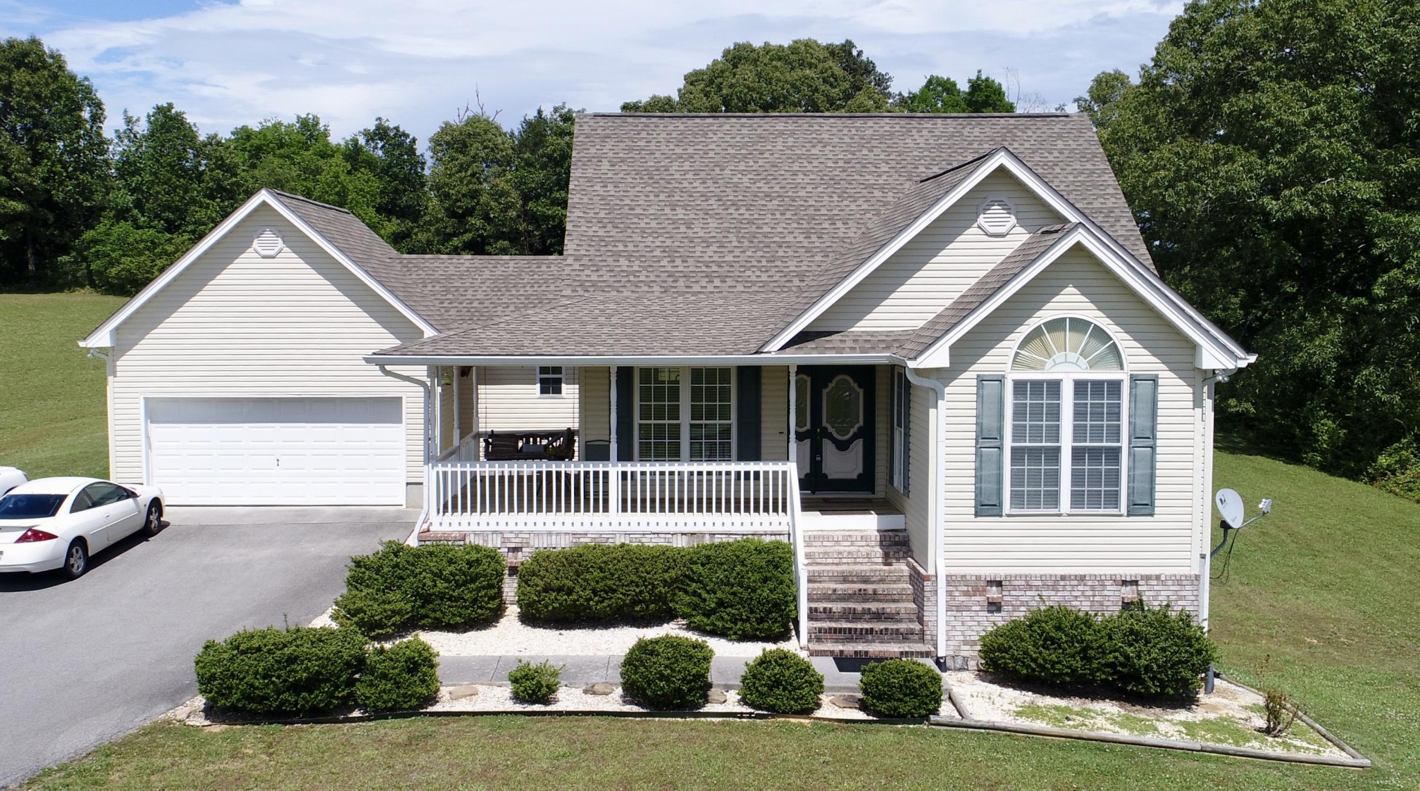 13711 Vonore Road Loudon, TN 37774 - Photo 1 of 34 a front view of a house with a yard