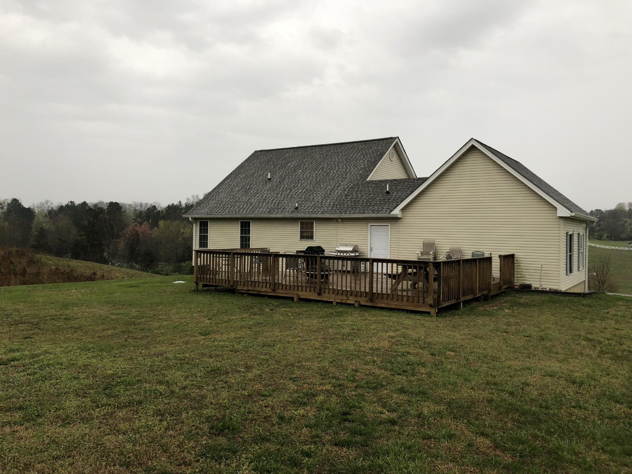 13711 Vonore Road Loudon, TN 37774 - Photo 11 of 34 a view of a house with a yard and sitting area