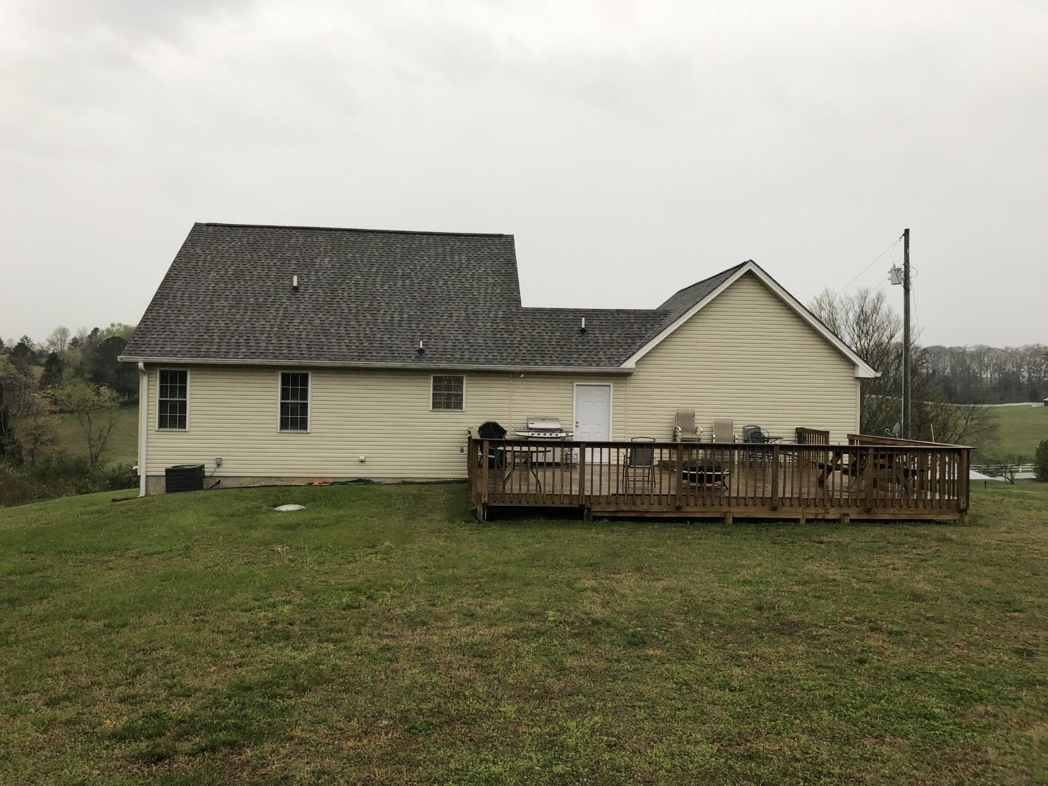 13711 Vonore Road Loudon, TN 37774 - Photo 13 of 34 a view of a house with a yard and sitting area