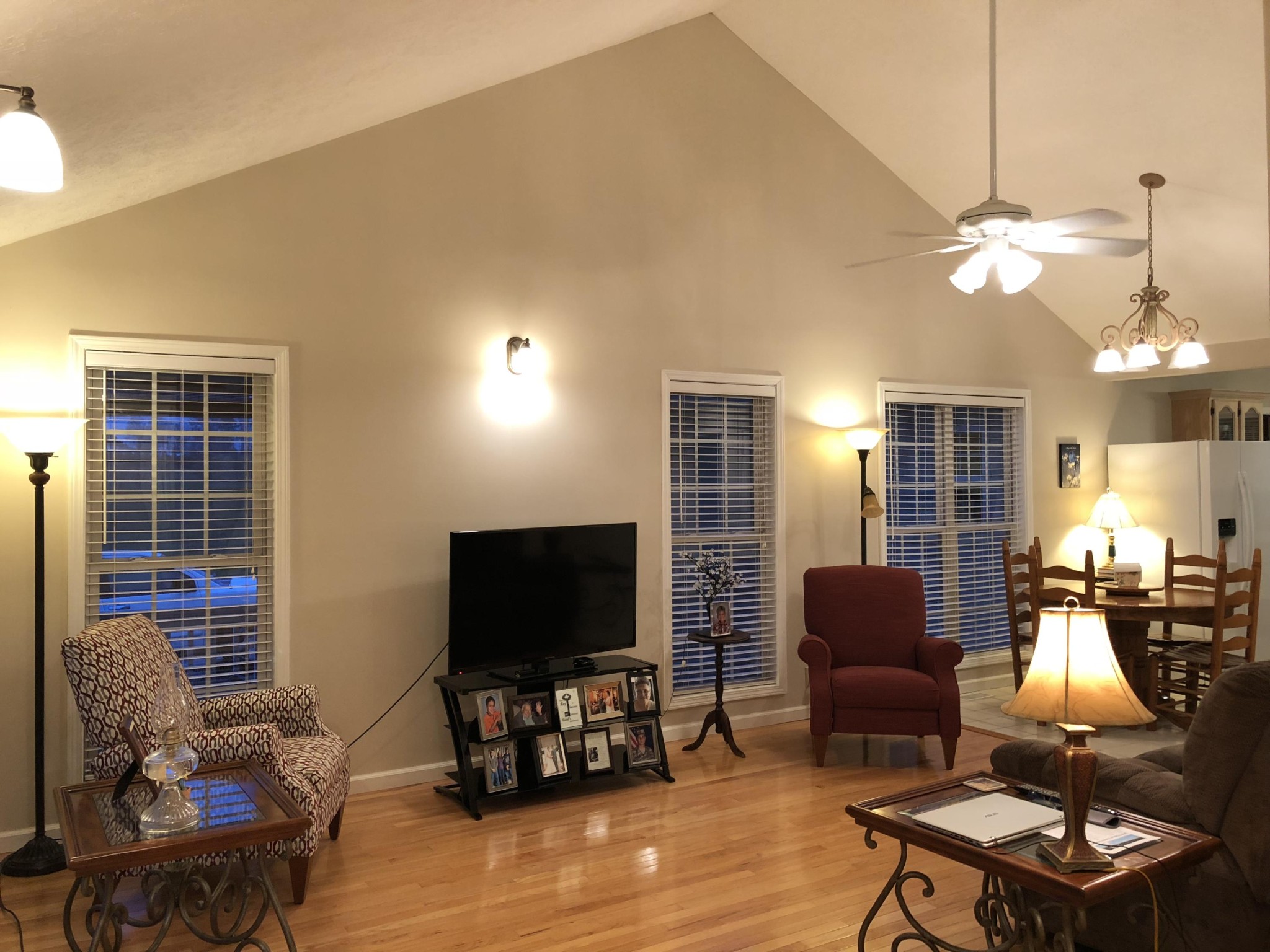 13711 Vonore Road Loudon, TN 37774 - Photo 15 of 34 a living room with furniture a dining table and a flat screen tv