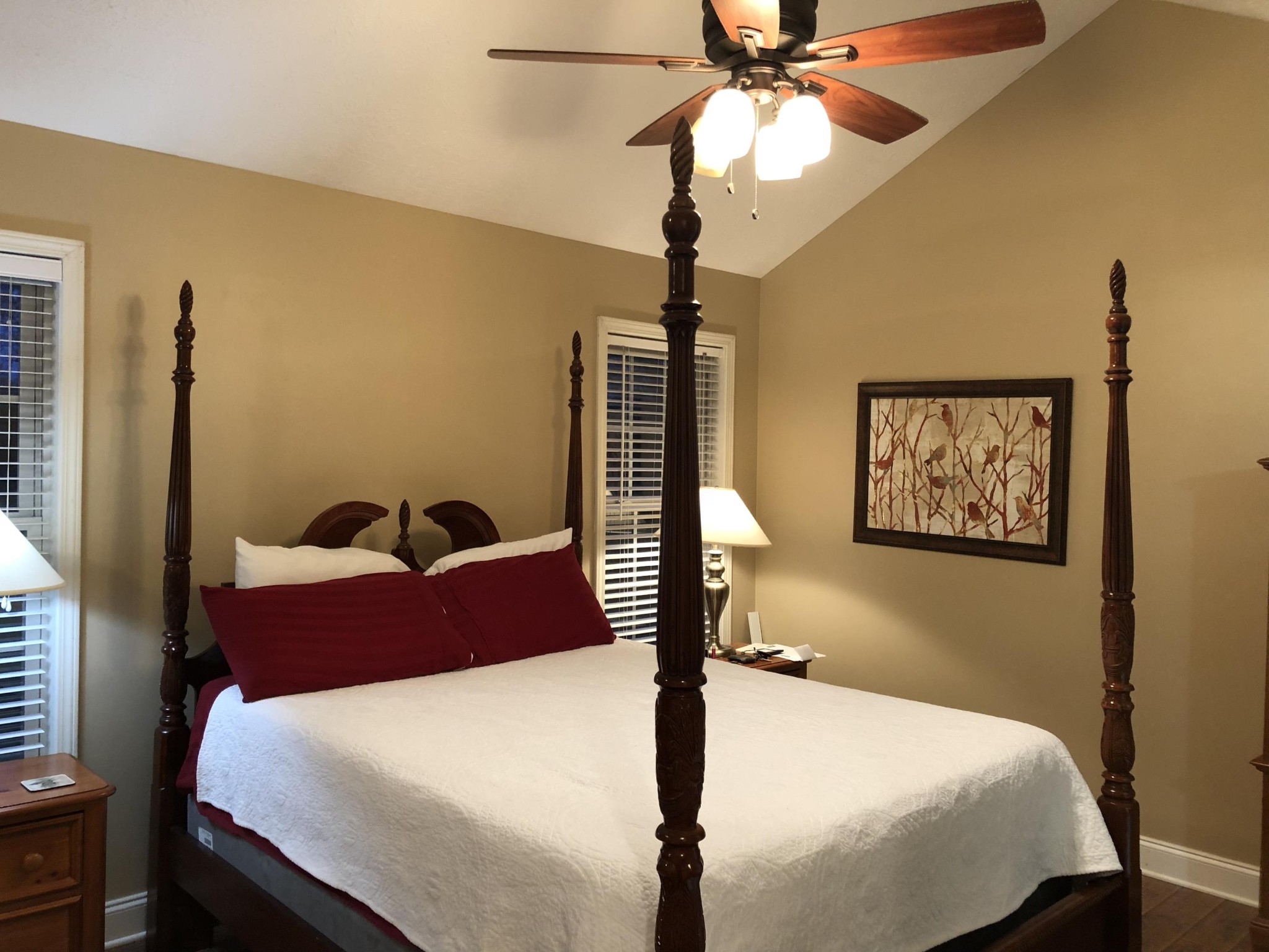 13711 Vonore Road Loudon, TN 37774 - Photo 23 of 34 a bedroom with a bed and a chandelier