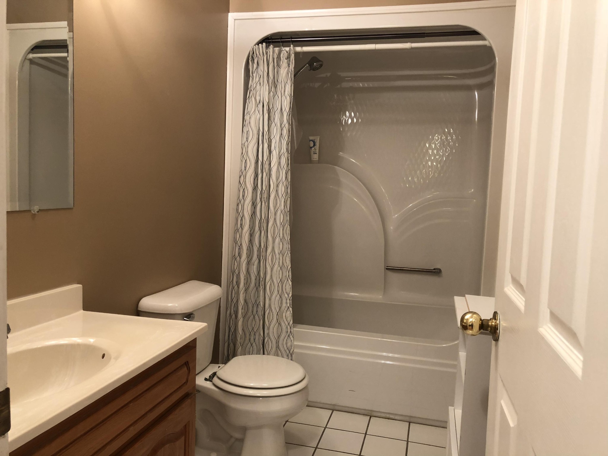13711 Vonore Road Loudon, TN 37774 - Photo 25 of 34 a bathroom with a sink a toilet and shower