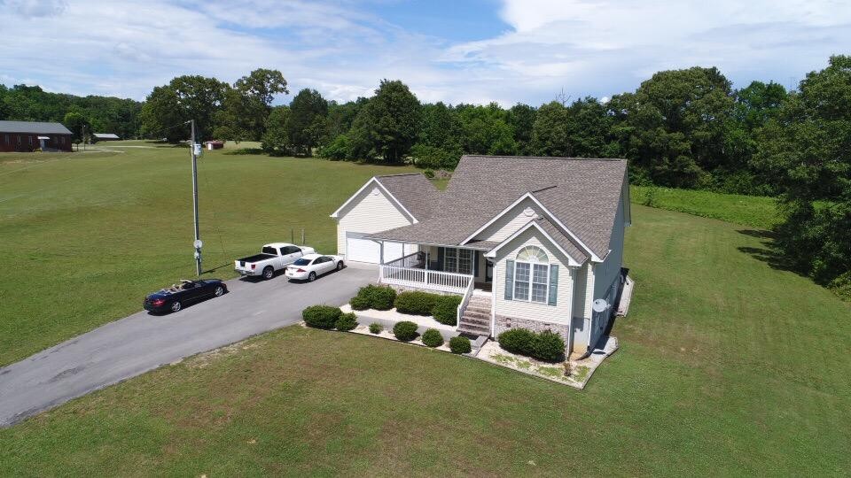 13711 Vonore Road Loudon, TN 37774 - Photo 3 of 34 a view of house with garden and outdoor space