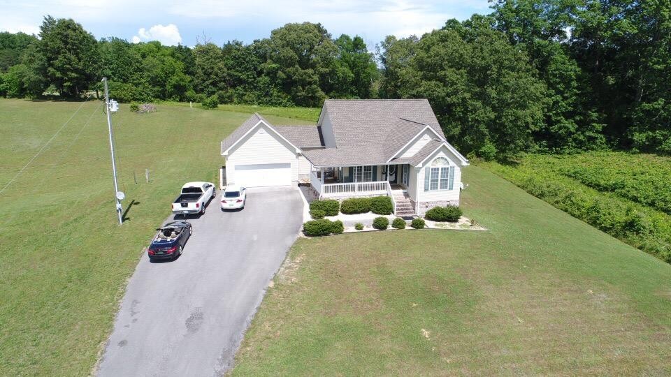 13711 Vonore Road Loudon, TN 37774 - Photo 4 of 34 a view of swimming pool with a back yard
