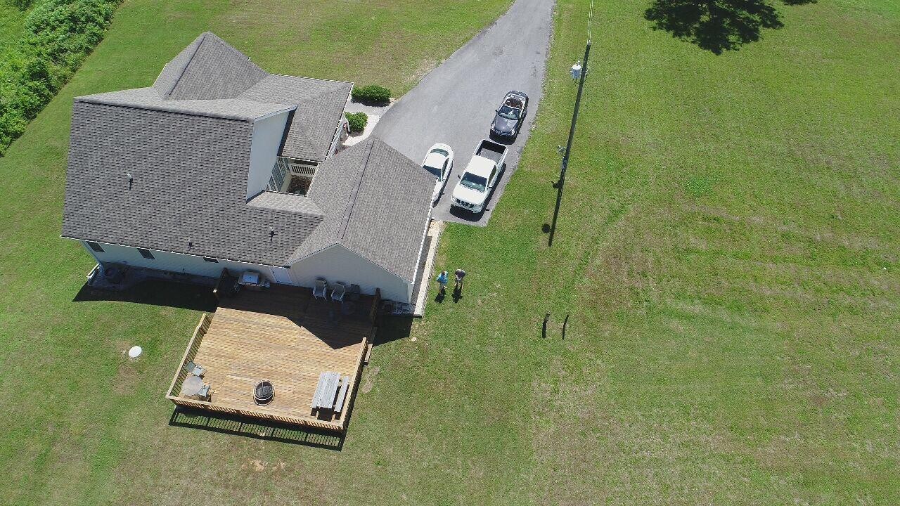 13711 Vonore Road Loudon, TN 37774 - Photo 8 of 34 an aerial view of a house with a yard