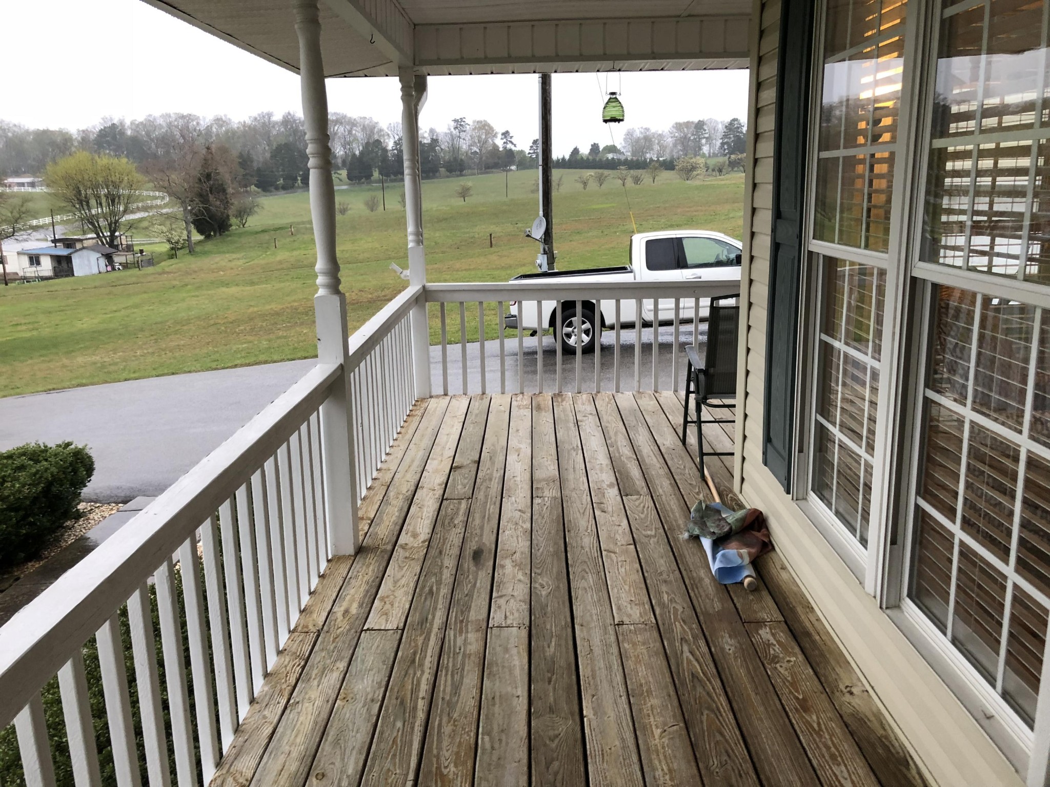 13711 Vonore Road Loudon, TN 37774 - Photo 10 of 34 a view of balcony with chairs and wooden floor