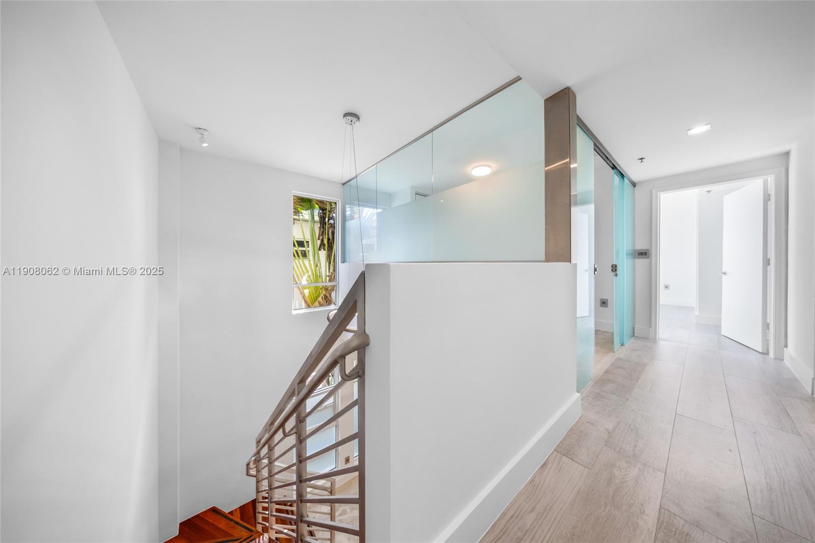 1545 Jefferson Avenue, Unit 103 Miami Beach, FL 33139 - Photo 14 of 35 a view of a hallway with wooden floor