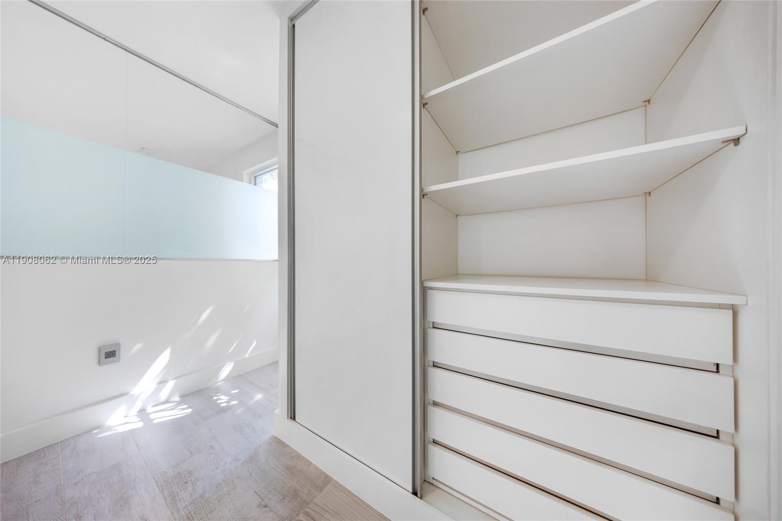 1545 Jefferson Avenue, Unit 103 Miami Beach, FL 33139 - Photo 17 of 35 a view of walk in closet