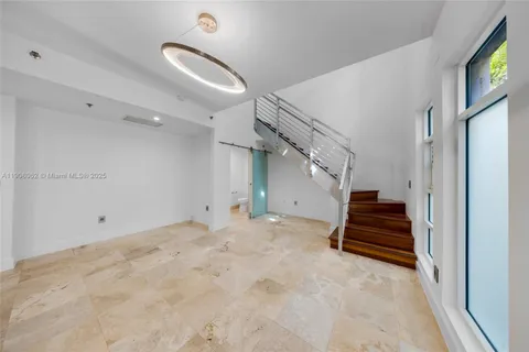a view of a kitchen with a sink