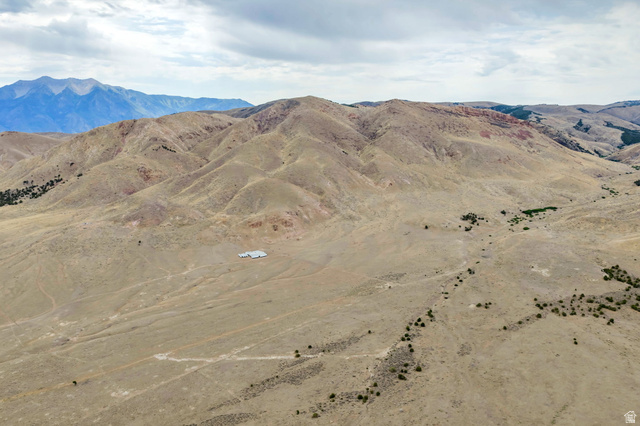 12800 South Crooked Cyn Road South Elberta, UT 84626 - Photo 32 of 48 Expansive high desert landscape featuring distant mountains and rolling hills