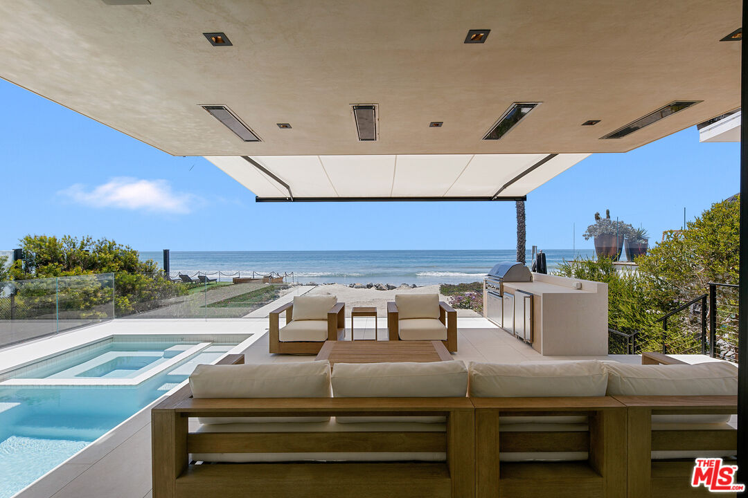 31224 Broad Beach Road Malibu, CA 90265 - Photo 1 of 54 a bed room with a bed