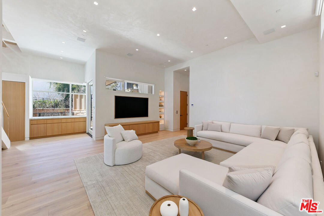 31224 Broad Beach Road Malibu, CA 90265 - Photo 15 of 54 a living room with furniture and a flat screen tv