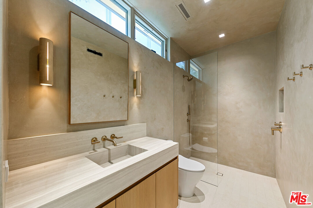 31224 Broad Beach Road Malibu, CA 90265 - Photo 17 of 54 a bathroom with a sink a toilet and shower
