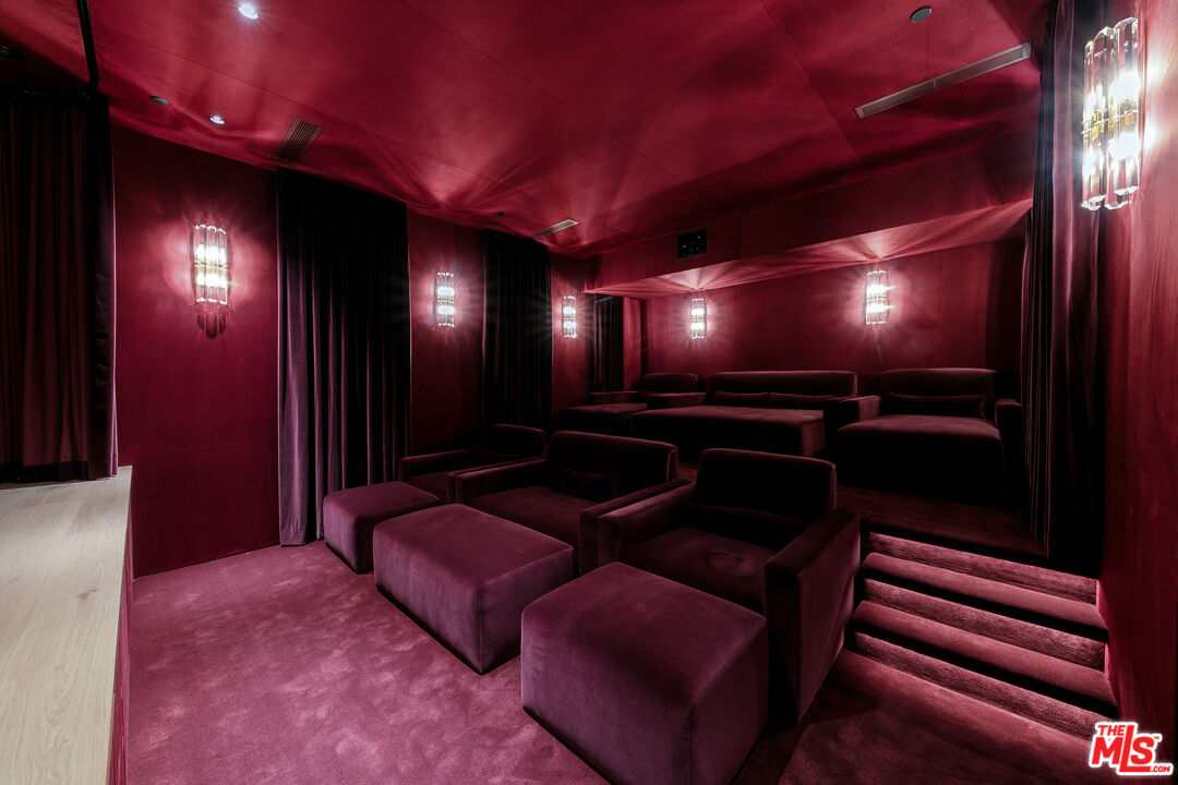31224 Broad Beach Road Malibu, CA 90265 - Photo 19 of 54 a media room with lots of chairs and a projector