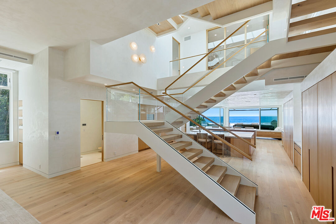 31224 Broad Beach Road Malibu, CA 90265 - Photo 20 of 54 a view of entryway and hall with wooden floor