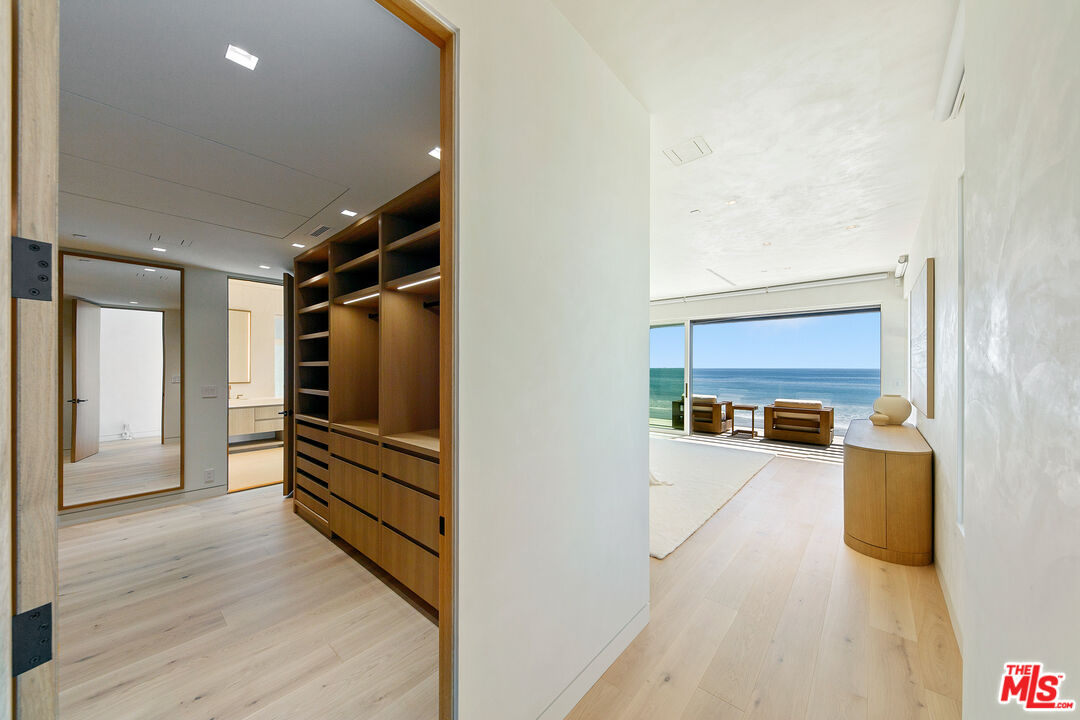 31224 Broad Beach Road Malibu, CA 90265 - Photo 21 of 54 a view of a living room with furniture and wooden floor