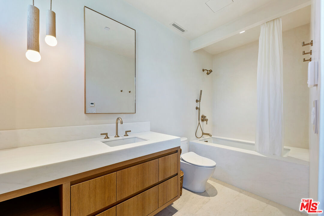 31224 Broad Beach Road Malibu, CA 90265 - Photo 34 of 54 a bathroom with a sink a toilet and shower