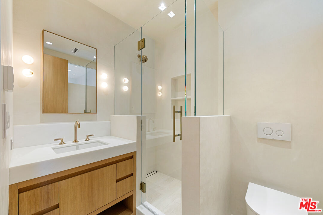 31224 Broad Beach Road Malibu, CA 90265 - Photo 36 of 54 a bathroom with a sink a toilet and shower