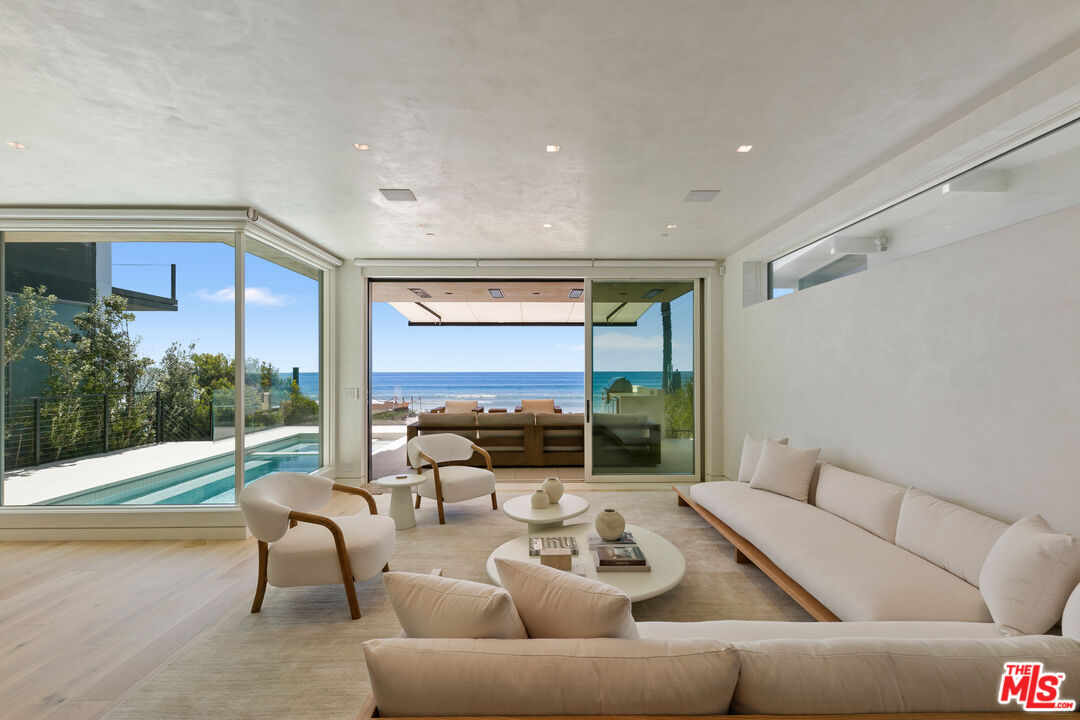 31224 Broad Beach Road Malibu, CA 90265 - Photo 4 of 54 a living room with furniture and a large window