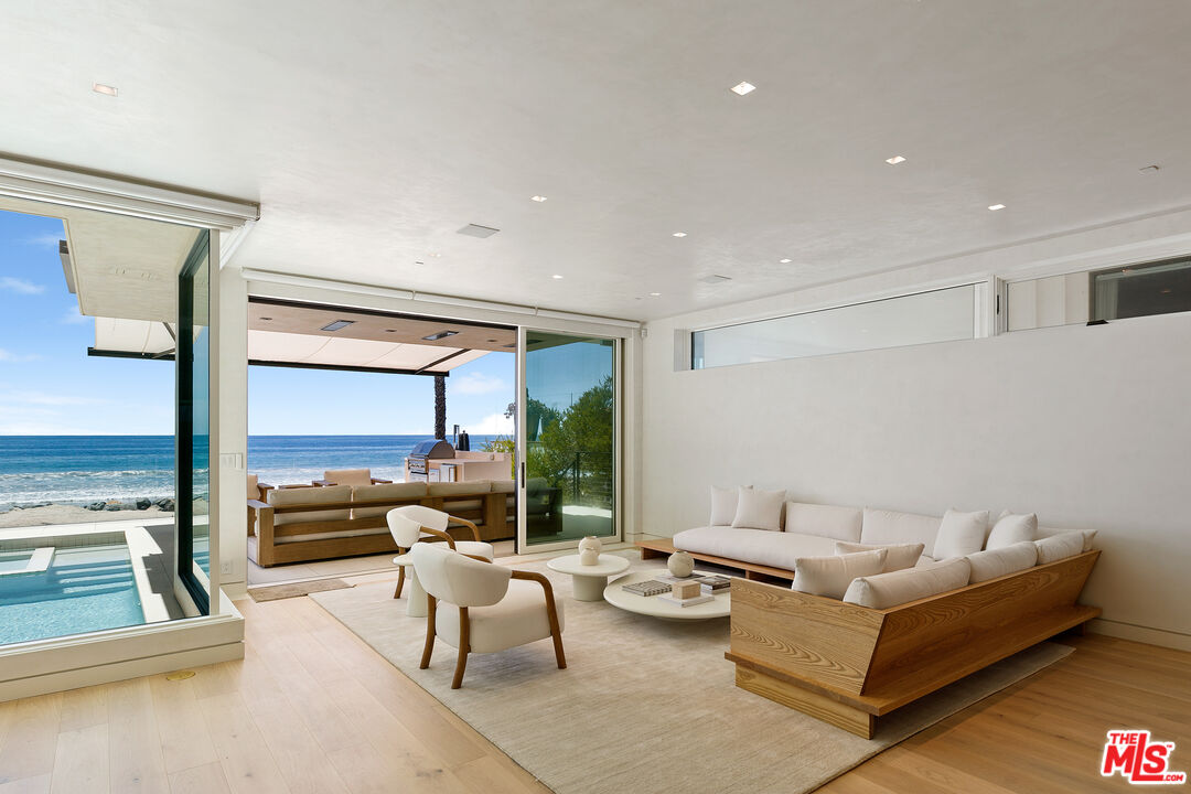 31224 Broad Beach Road Malibu, CA 90265 - Photo 6 of 54 a living room with furniture and a large window
