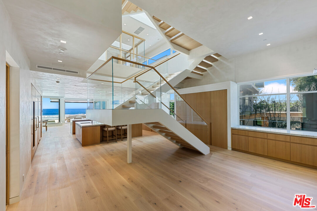 31224 Broad Beach Road Malibu, CA 90265 - Photo 7 of 54 a view of entryway and hall with wooden floor