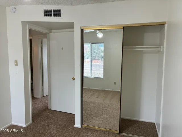 a view of elevator with hallway