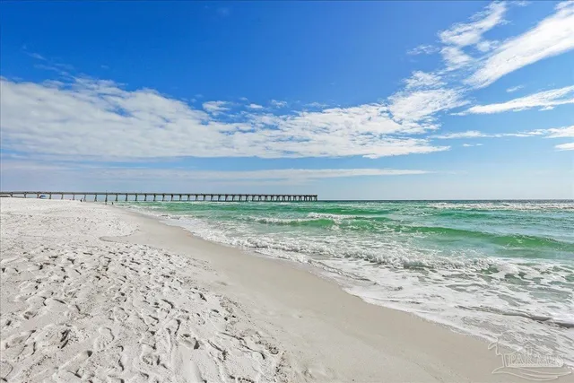 a view of a pathway with a yard