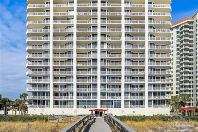 a view of a building with a swimming pool