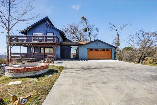 a front view of a house with entertaining space