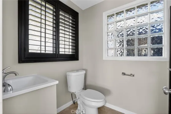 a bathroom with a sink and a toilet