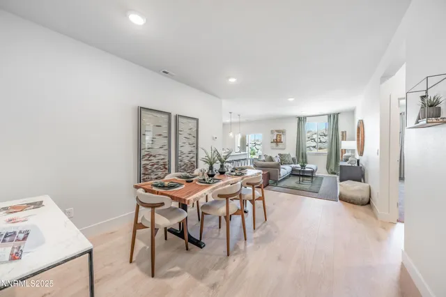 a kitchen with stainless steel appliances granite countertop a stove microwave sink and refrigerator