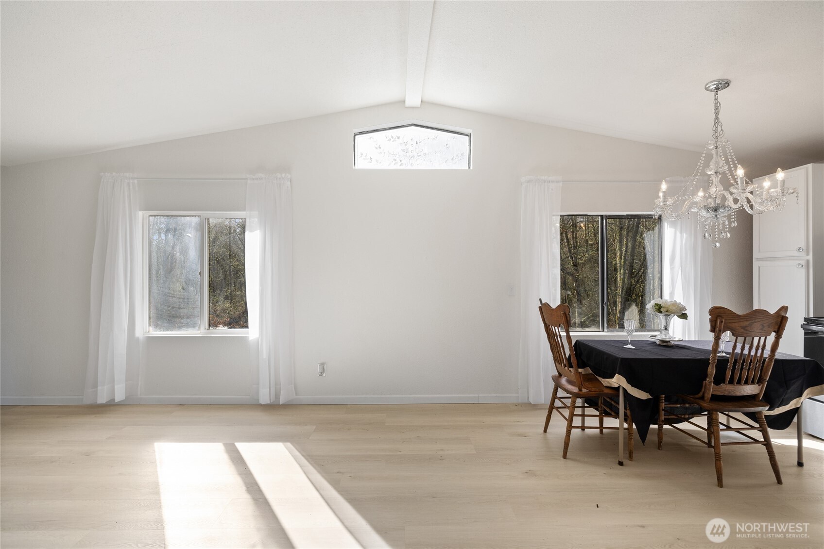 14512 246th Street East Graham, WA 98338 - Photo 15 of 39 a view of a dining room with furniture and window