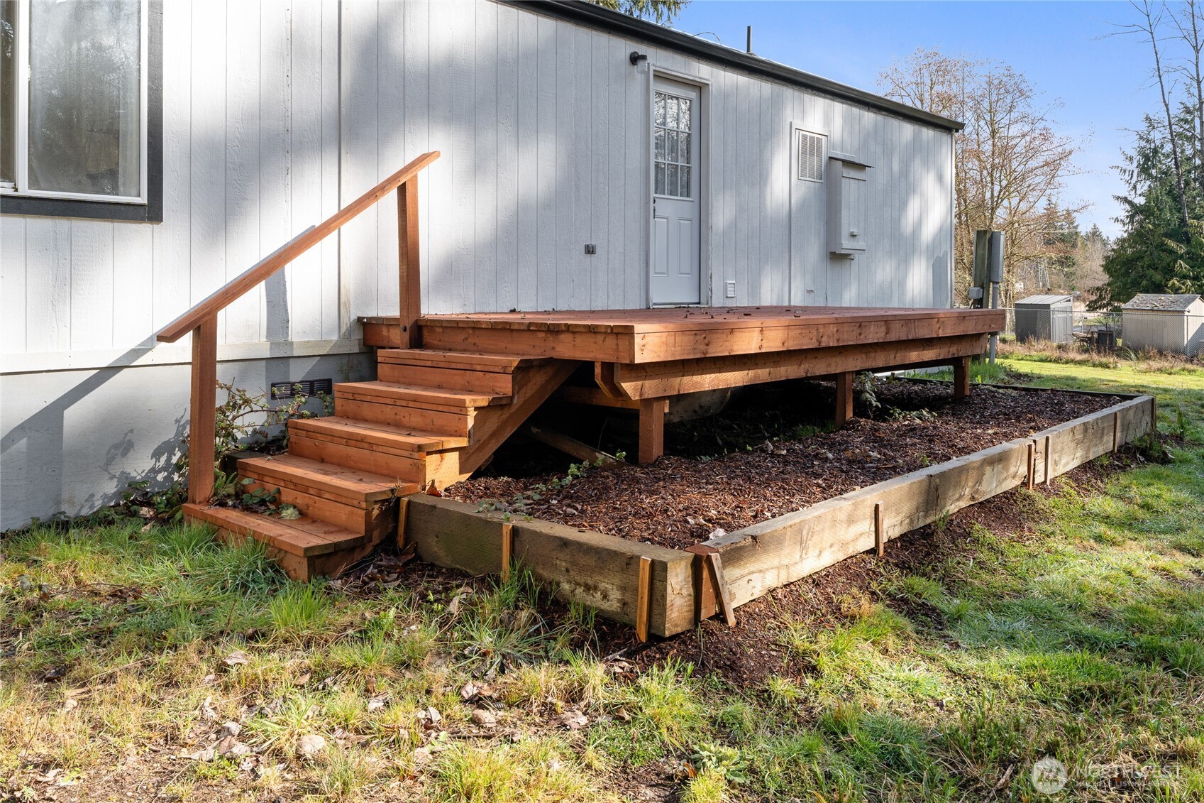 14512 246th Street East Graham, WA 98338 - Photo 32 of 39 a backyard of a house with outdoor seating