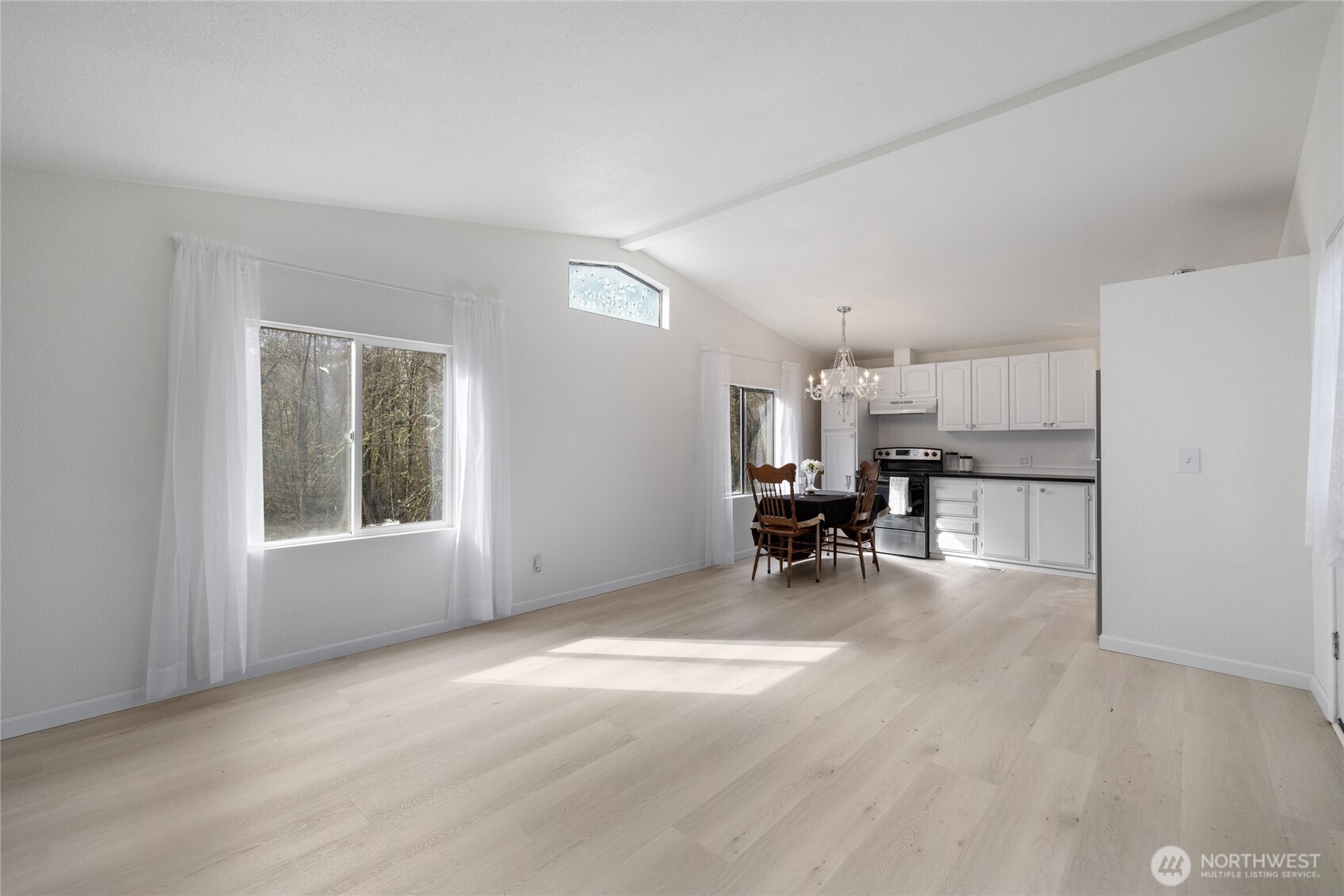 14512 246th Street East Graham, WA 98338 - Photo 6 of 39 a view of a livingroom with furniture and a window