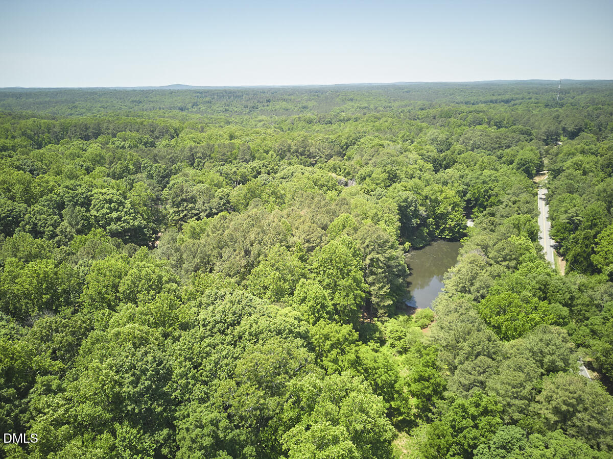 4204 Kerley Road Durham, NC 27705 - Photo 12 of 34 an aerial view of residential houses with outdoor space and trees