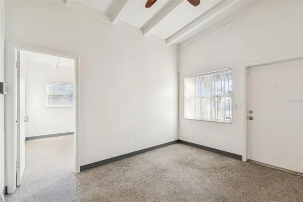 an empty room with windows
