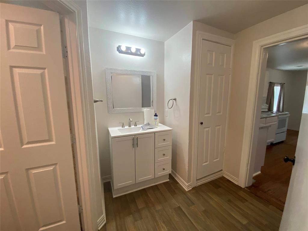 810 Greenville Road McKinney, TX 75069 - Photo 14 of 21 a view of hallway with wooden floor