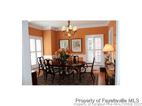 1816 Morganton Road Fayetteville, NC 28305 - Photo 6 of 24 a view of a dining room with furniture and window