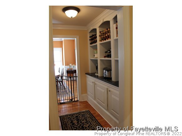 1816 Morganton Road Fayetteville, NC 28305 - Photo 9 of 24 a kitchen with a sink and cabinets